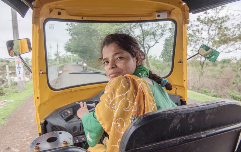 Talat Jahan, a domestic abuse survivor, sits in her tuk-tuk in Bhopal India. (Thomson Reuters Foundation Photo)